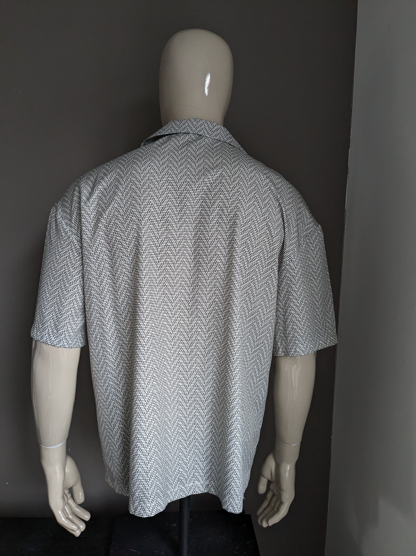 Vintage -Shirt Kurzarm. Schwarz -Weiß -Druck. Größe L.
