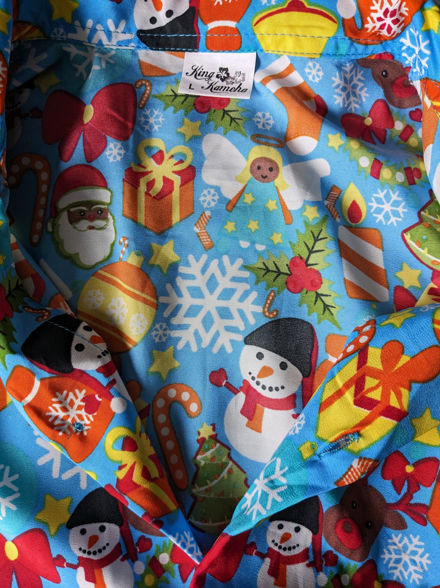 Rey Kameha camisa manga corta. Impresión de Navidad / Invierno. Tamaño L / XL.