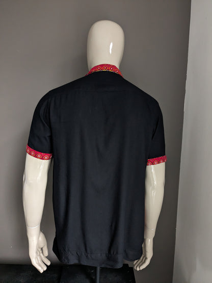 Ransak shirt short sleeve. Black red yellow print. Size L.