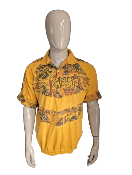 Vintage polo with elastic band. Dark yellow with print. Size L.