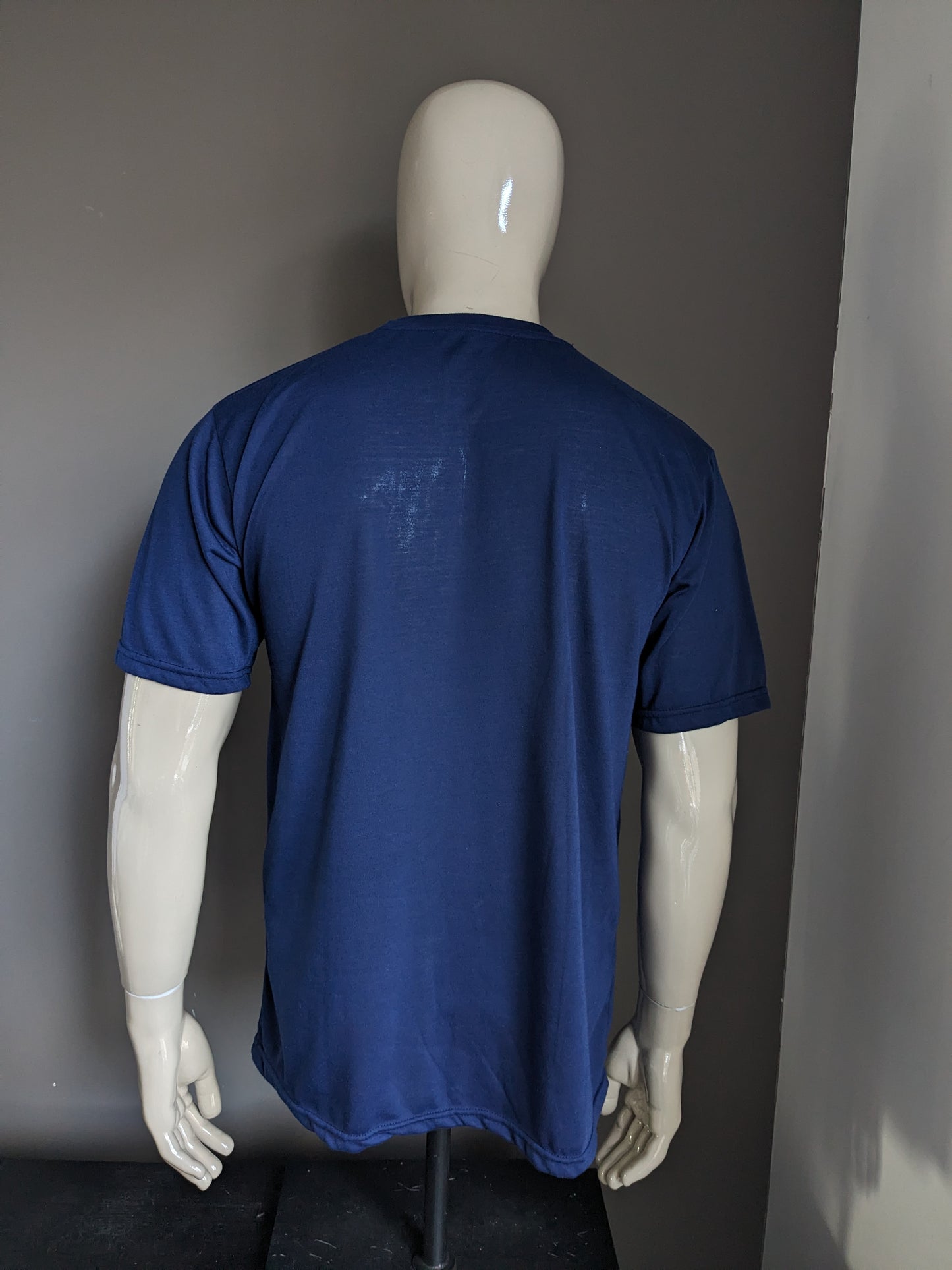 Donkerblauw shirt met uil opdruk. Maat XL.