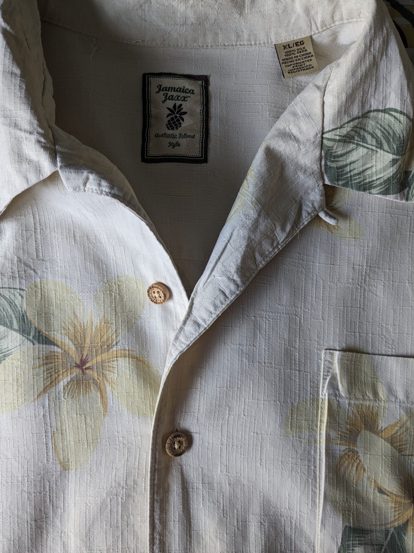 Jamaica Jaxx original Hawaii shirt short sleeve. Silk with beige yellow green flowers print. Size XL.