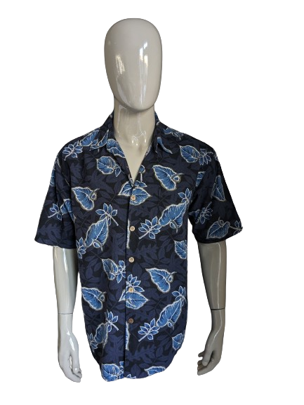 Selta corta Paradise Blue Hawaii Shirt. Motivo a foglie blu. Taglia XL. 70% di seta.