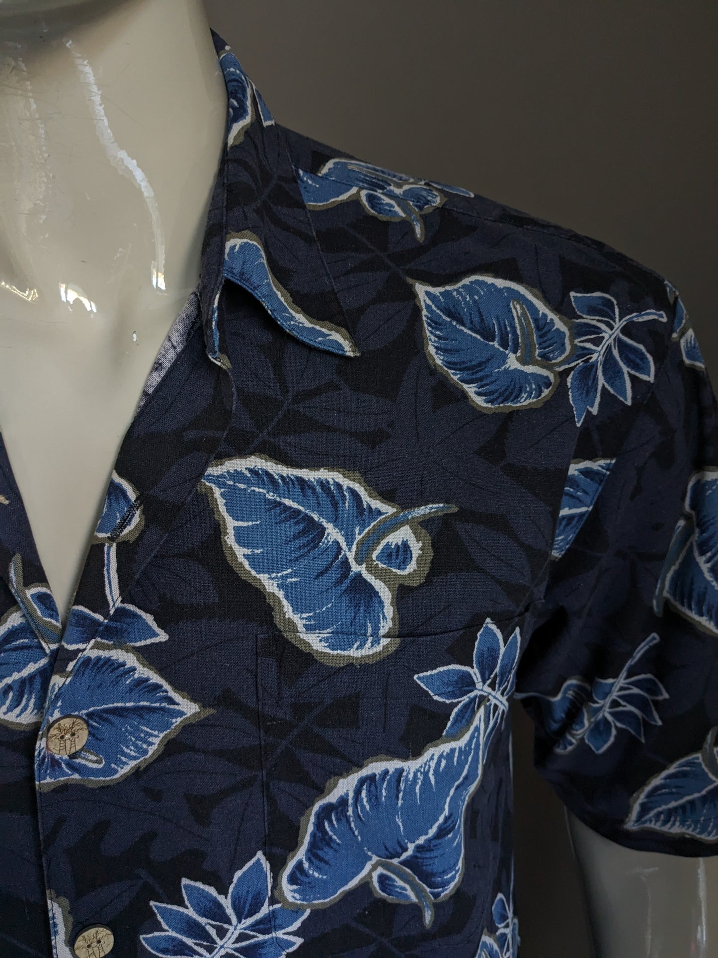 Paradise Blue Silk Hawaii Camisa Manga corta. Motivo de hoja azul. Tamaño xl. 70% de seda.