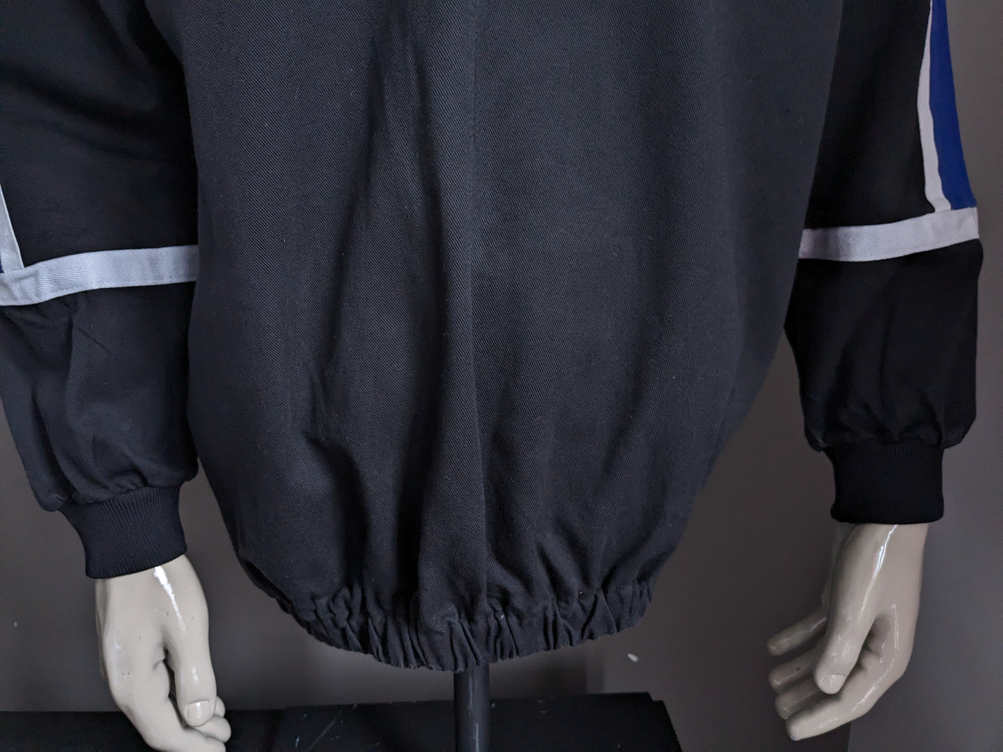 Séter de polo original de Mizuno "Reading Football Club". Black White Blue de color. Tamaño XL