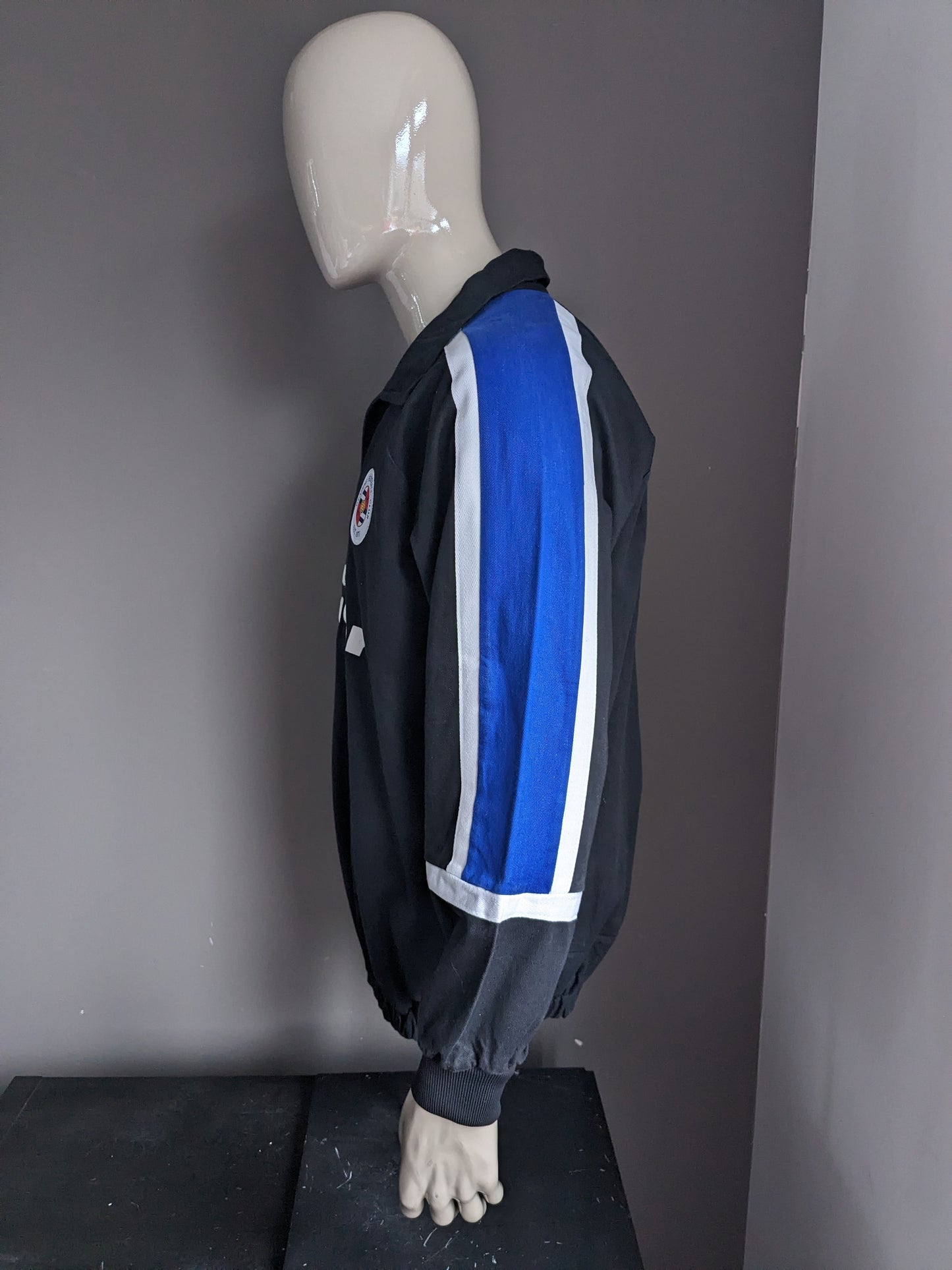 Mizuno Original "Reading Football Club" polo trui. Zwart Wit Blauw gekleurd. Maat XL