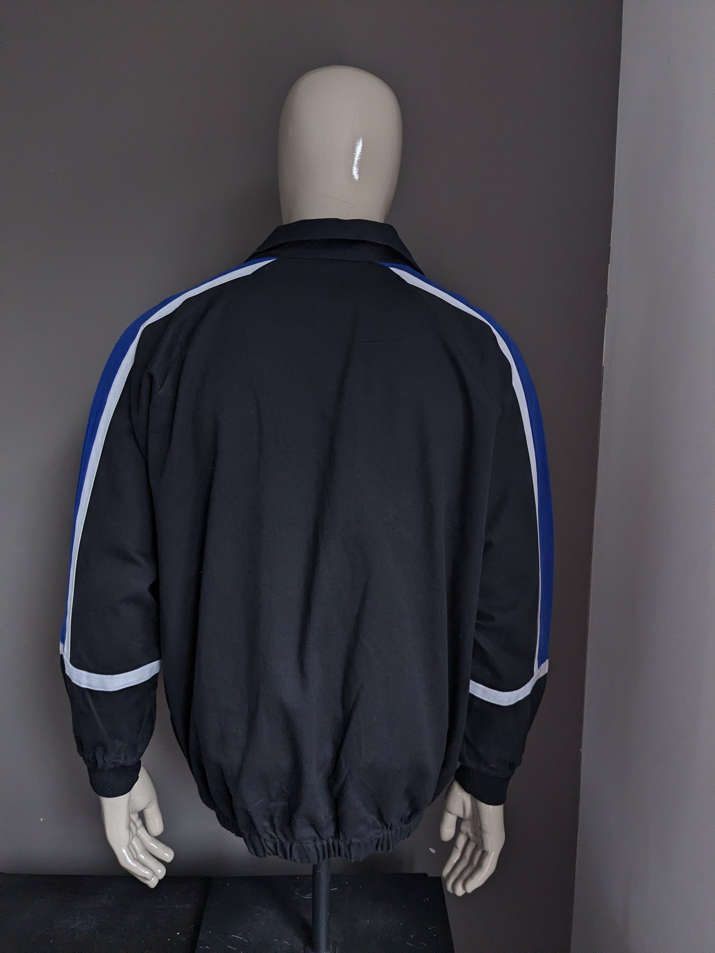 Séter de polo original de Mizuno "Reading Football Club". Black White Blue de color. Tamaño XL
