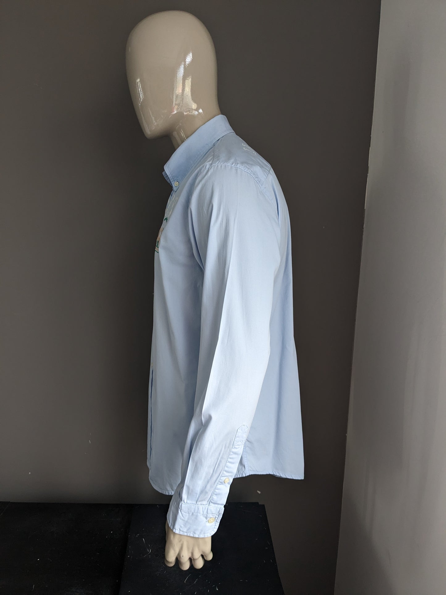 Shirt La Martina. Azzurro con applicazioni. Taglia XL.