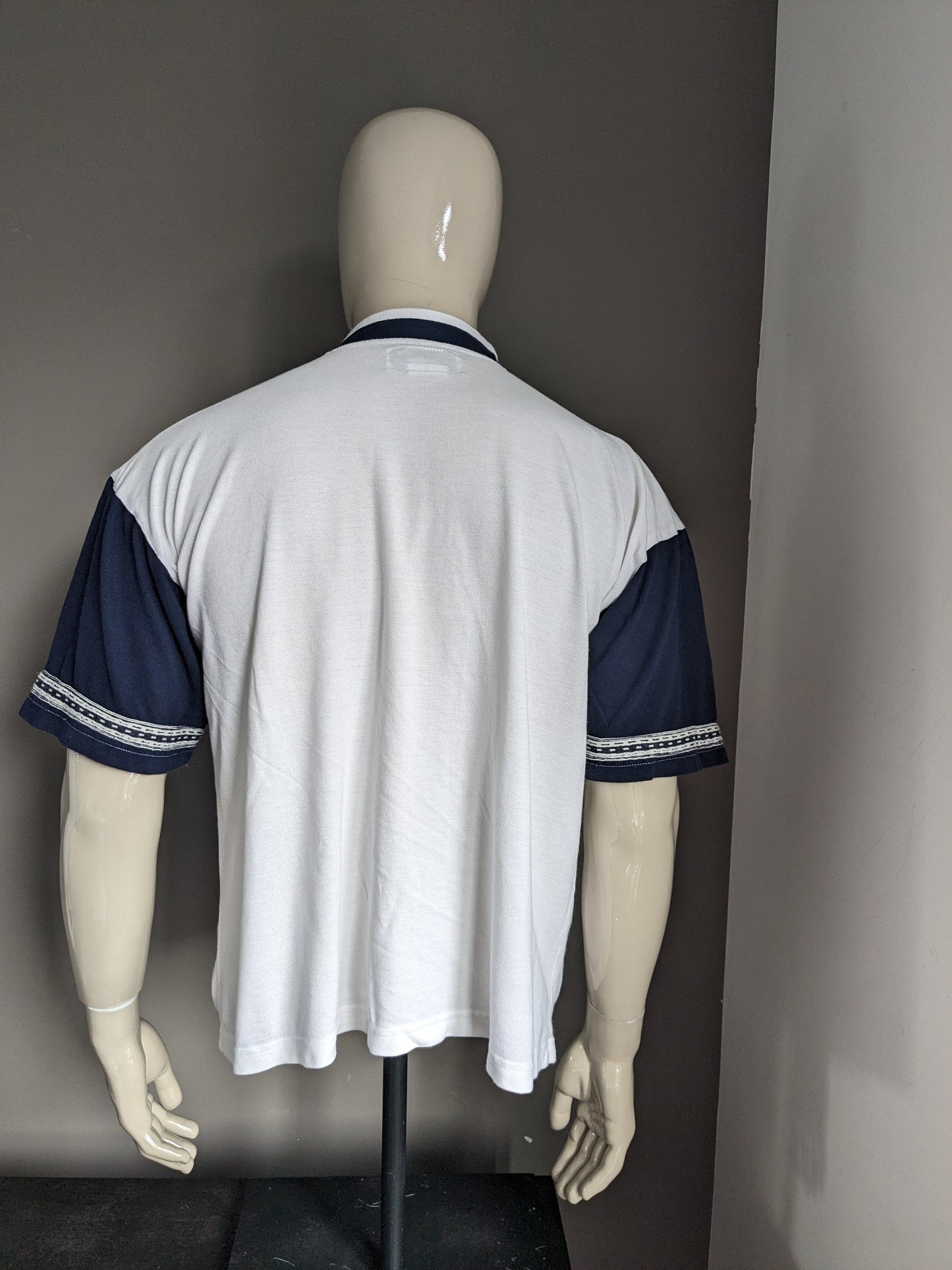Vintage Sun City Polo with zipper. Blue white colored. Size XL.
