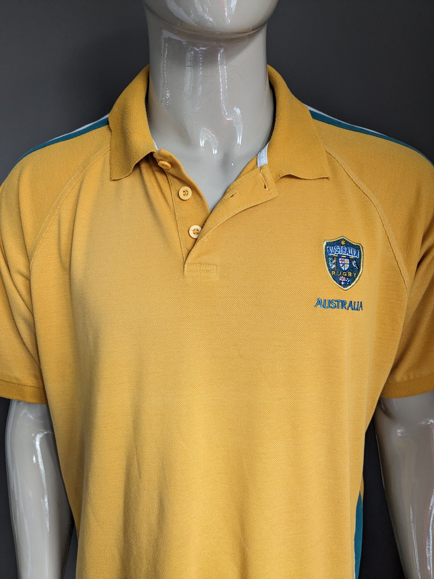 Vintage Australia Rugby polo. Groen Wit Geel gekleurd. Maat 2XL / XXL.