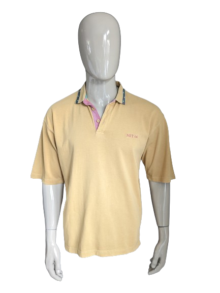 Vintage Net 64 Polo. Mustard colored yellow. Size L / XL.