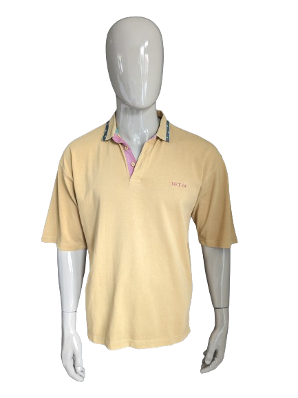 Vintage NET 64 Polo. Senfgelb gefärbt. Größe L/XL.