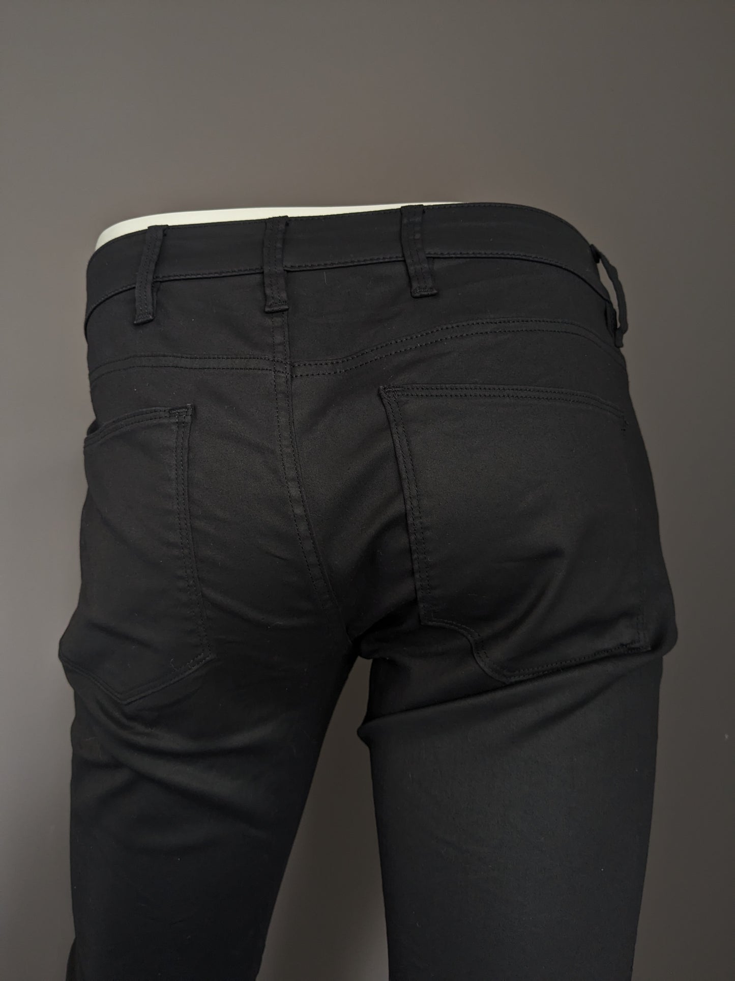 G-Star Jeans crudos. Revestimiento negro. Tipo 5620 Custom. Tamaño W29 - L32. Estirar.