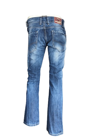 Tommy Hilfiger Jeans. Blau gefärbt. Größe W29 - L32. Geben Sie Rogar ein. Normale Passform.