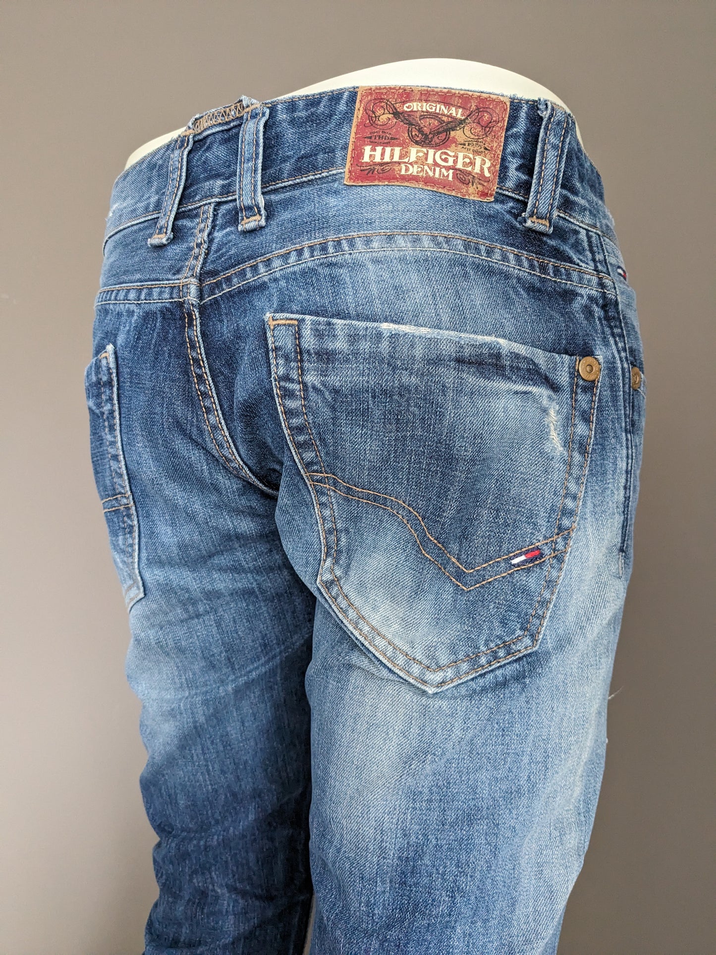 Tommy Hilfiger Jeans. Blue colored. Size W29 - L32. Type Rogar. Regular fit.