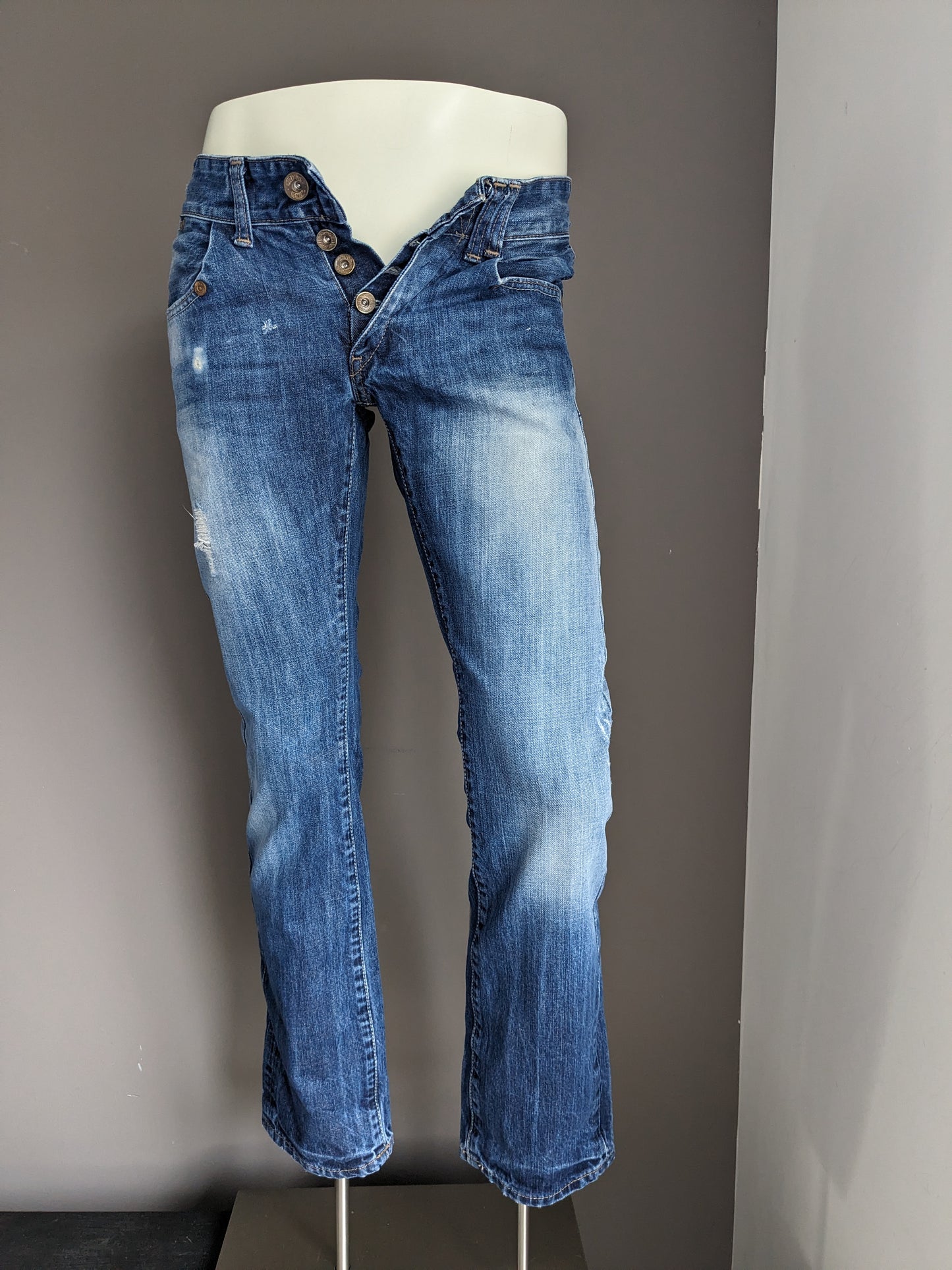 Tommy Hilfiger jeans. Blauw gekleurd. Maat W29 - L32. type Rogar. Regular Fit.