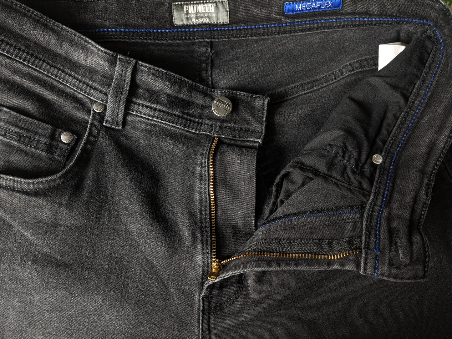 Pioneer jeans. Black colored. Type Rando. Megaflex. Size W33 - L30. (shortened)