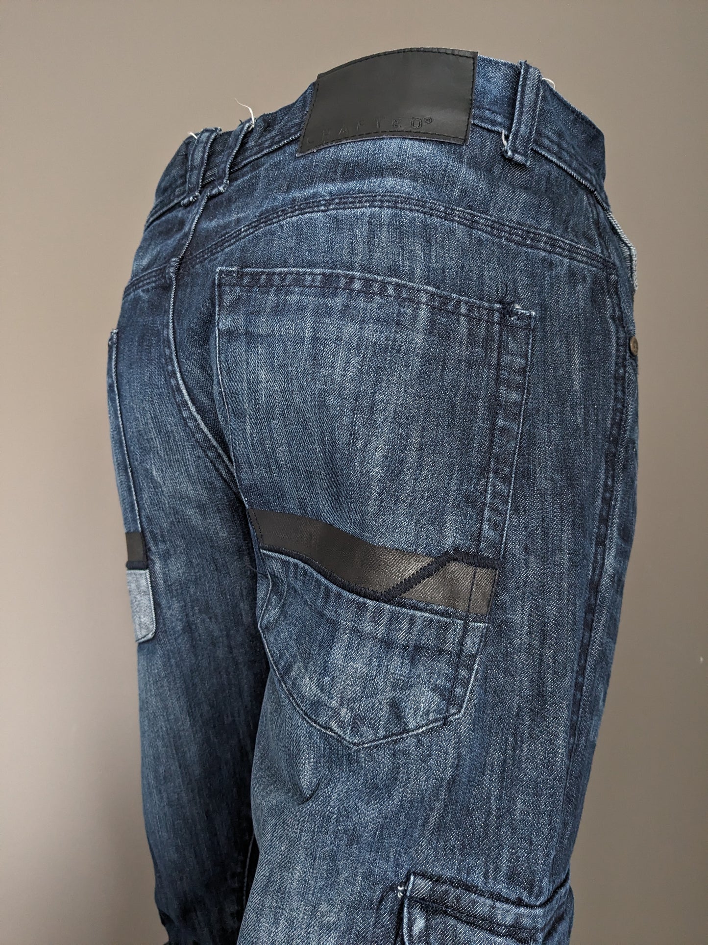 Jeans realizzati. Colorato blu scuro. Taglia W32 - L34.
