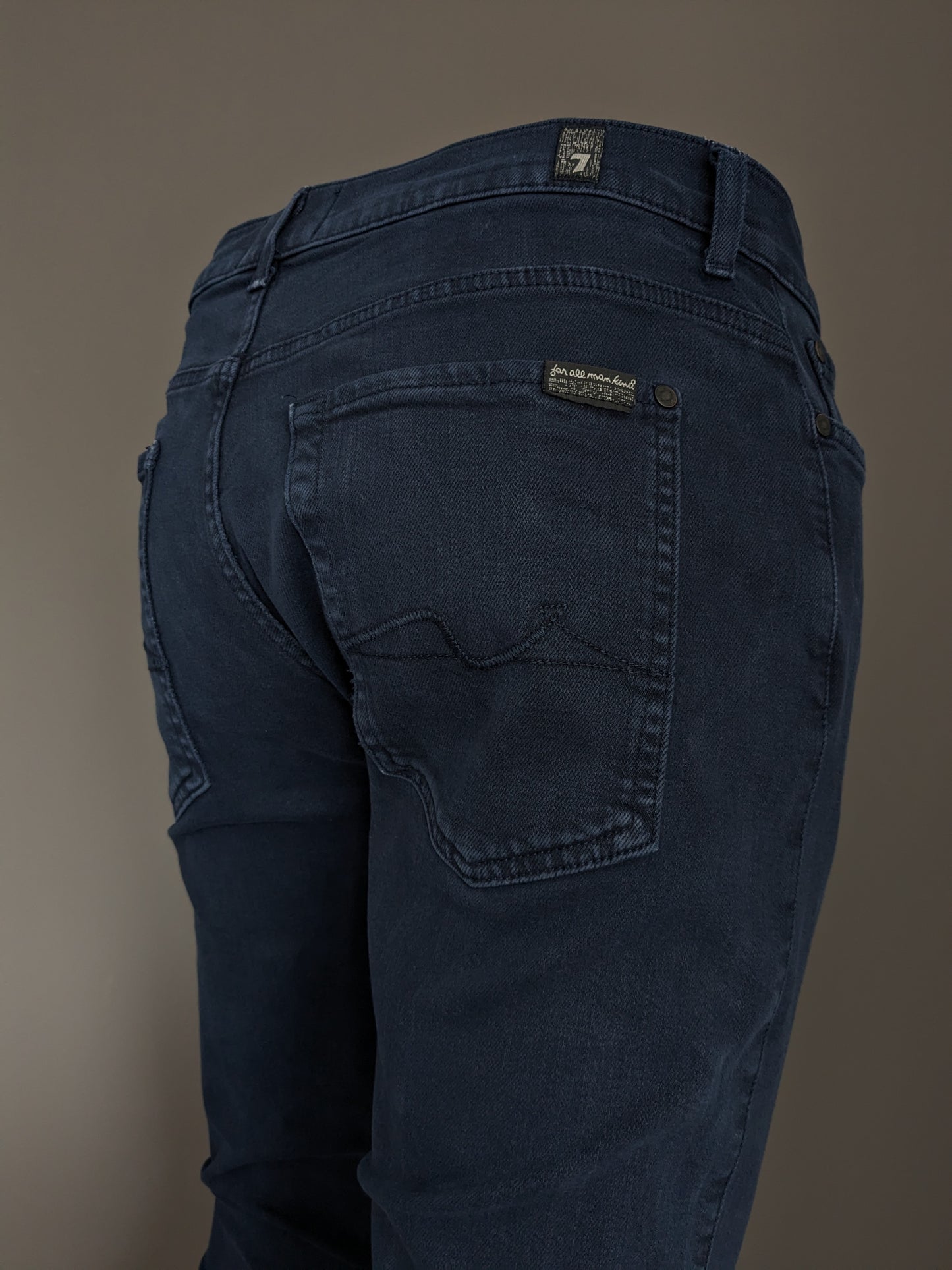 7 pour tous les jeans de l'humanité. Couleur bleu foncé. Taille W33 - L34. extensible.