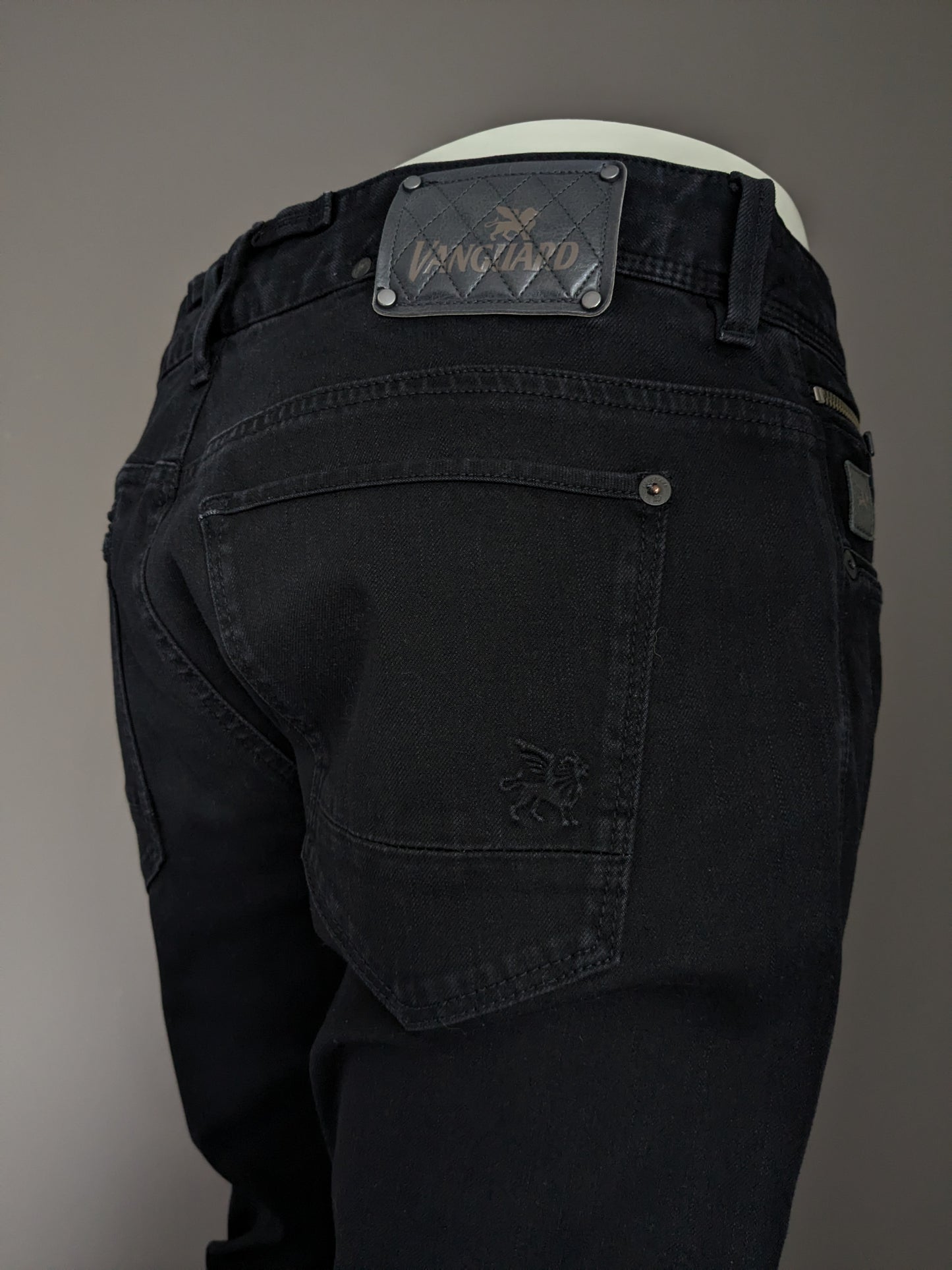 Jeans de vanguardia. Color negro. Tamaño W34 - L36. estirar. Escriba "V850 Rider". Ajustado.