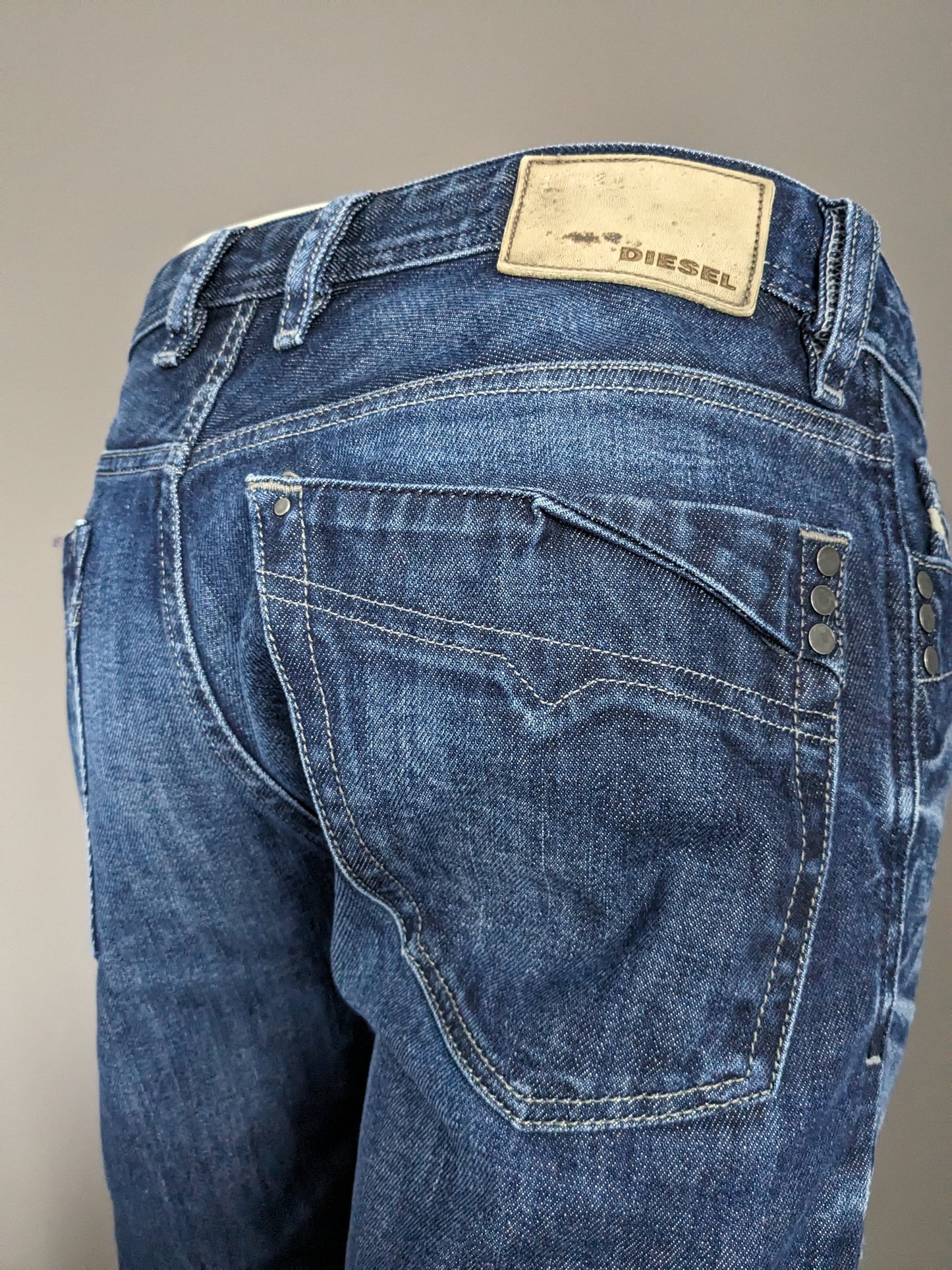 Diesel jeans. Dark blue colored. Size W31 - L32. Type "Mennit".