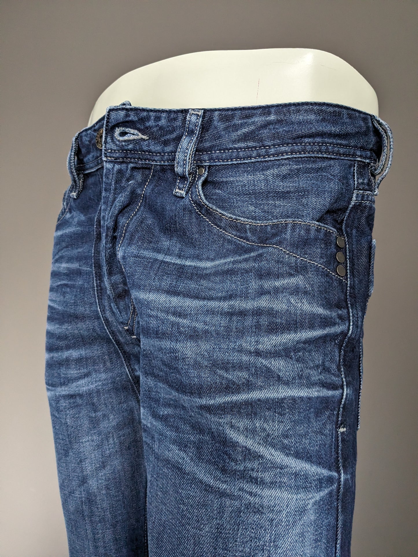 Jeans diesel. Colorato blu scuro. Taglia W31 - L32. Digita "Mennit".