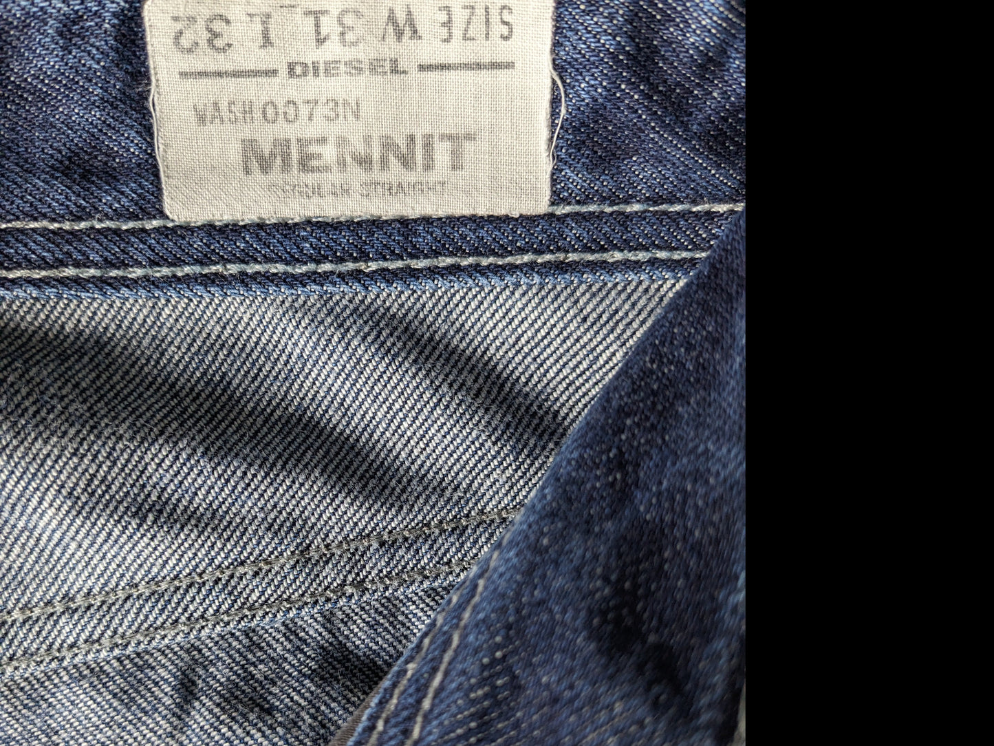 Diesel jeans. Dark blue colored. Size W31 - L32. Type "Mennit".