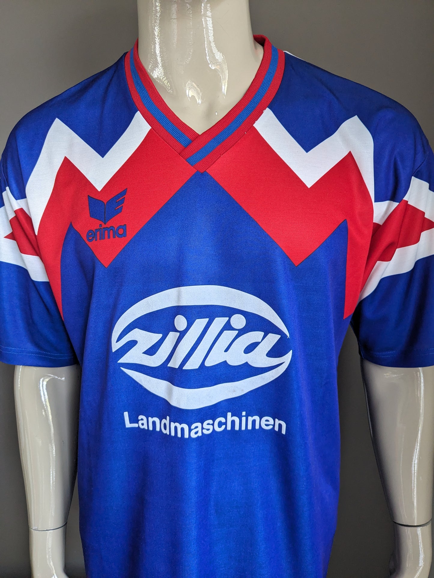 Vintage Erima sport shirt met V-Hals. Rood Blauw Wit gekleurd. Maat XL.