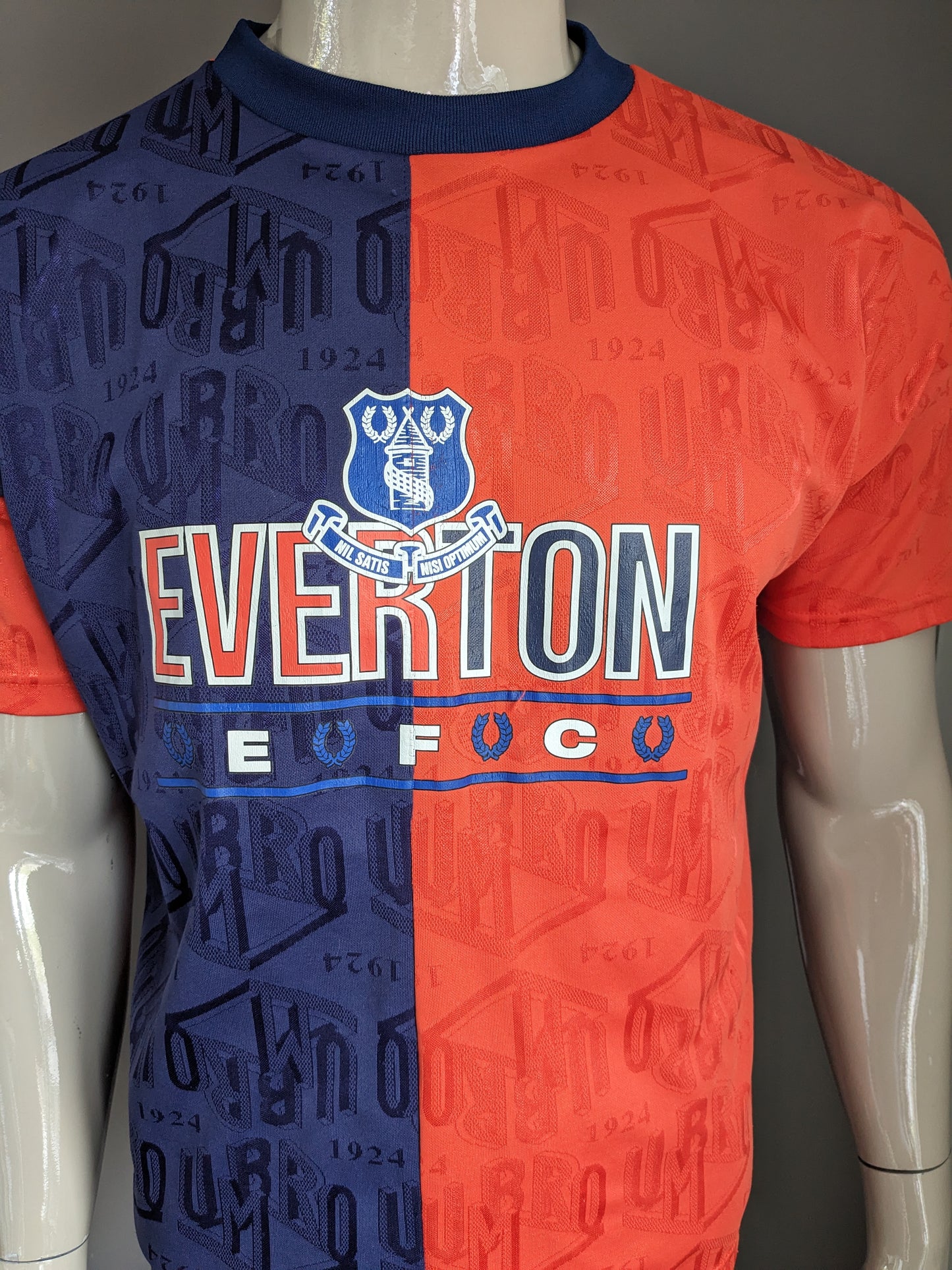 Vintage Umbro Everton Sport Shirt. Blau orangefarbenes Motiv. Größe (s) / L.