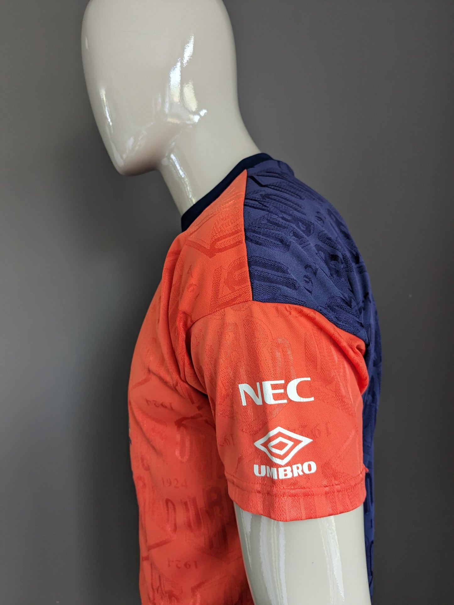 Camisa Vintage Umbro Everton Sport. Motif de color naranja azul. Tamaño (s) / L.