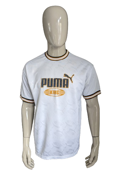 Camisa Vintage Puma Sport. Blanco azul amarillo con estampado. Talla L.