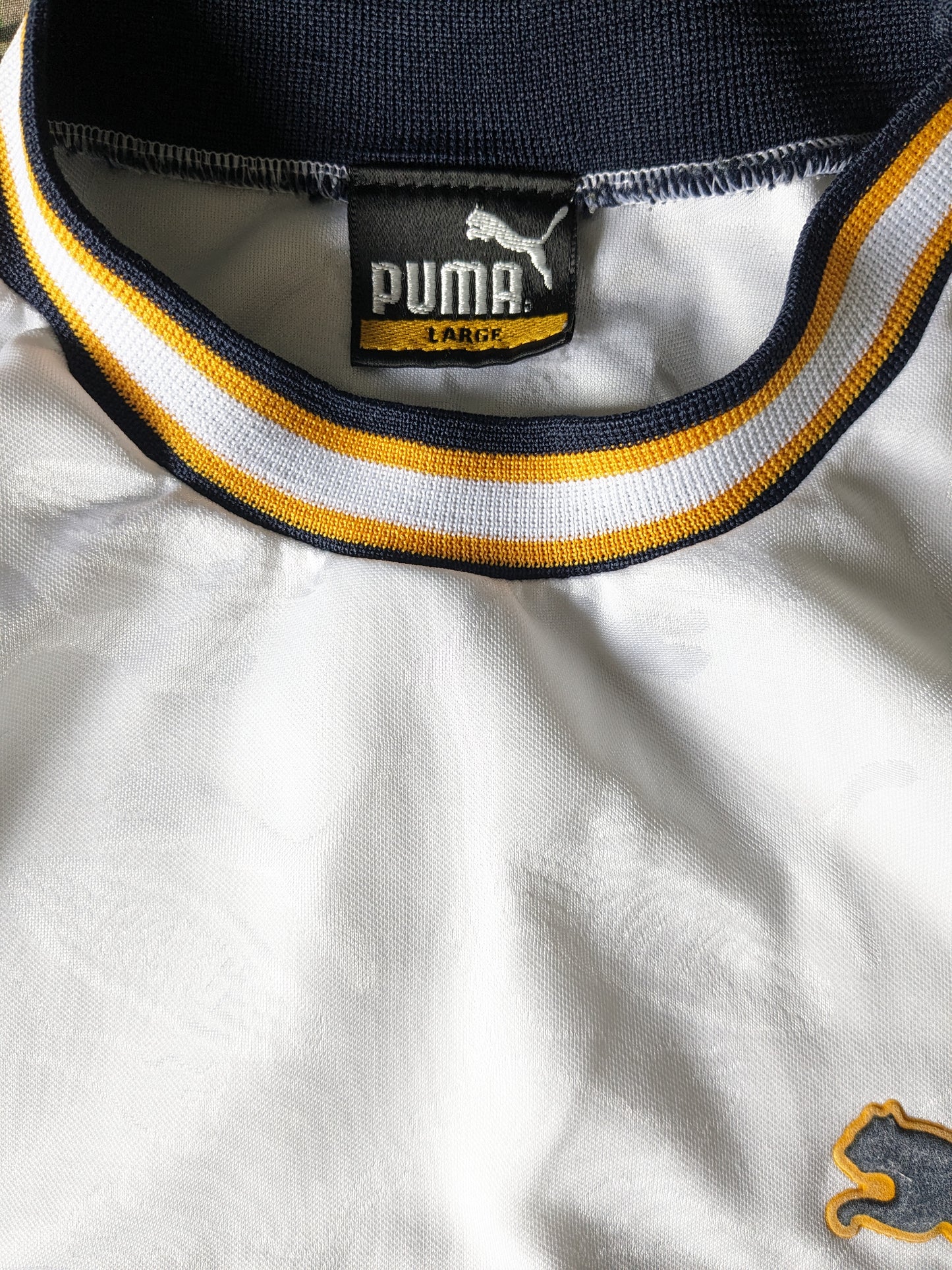 Vintage Puma sport shirt. Geel Blauw Wit met opdruk. Maat L.