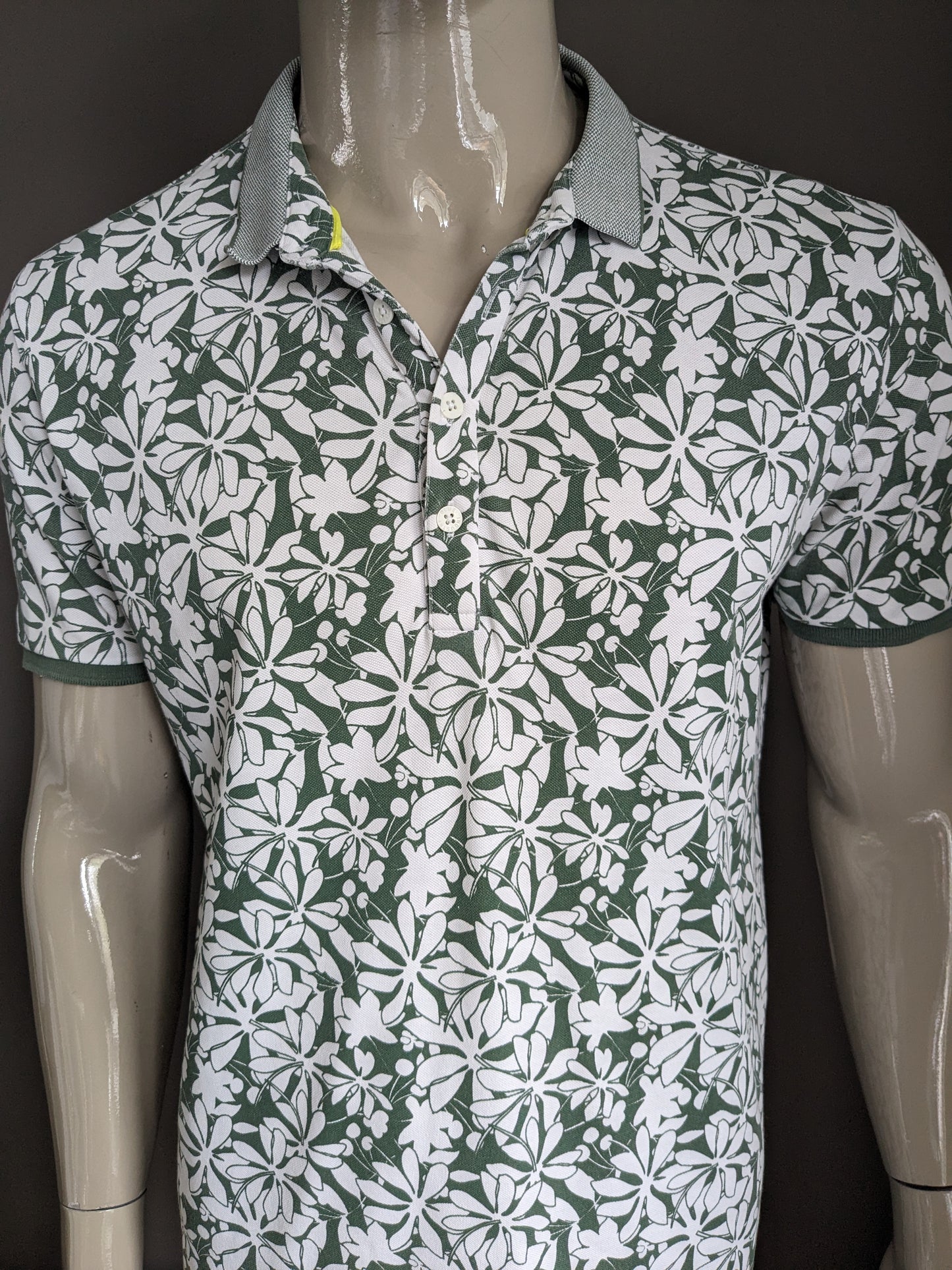 Blue Industry Polo. Green white flowers print. Size XL.