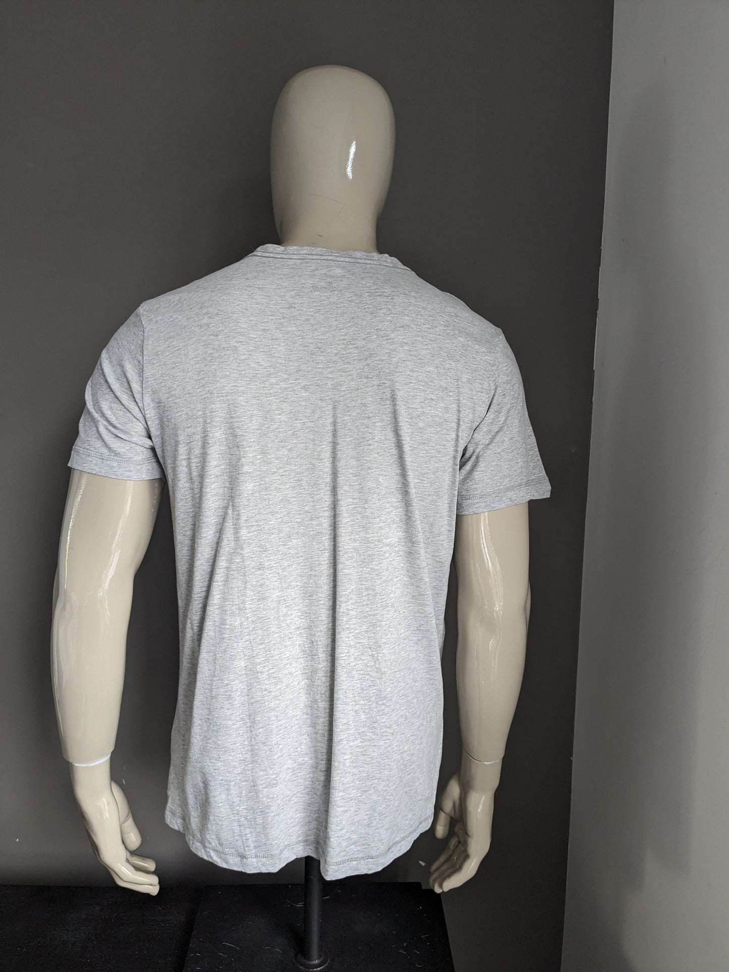 Puma shirt. Gray mixed with print. Size L.