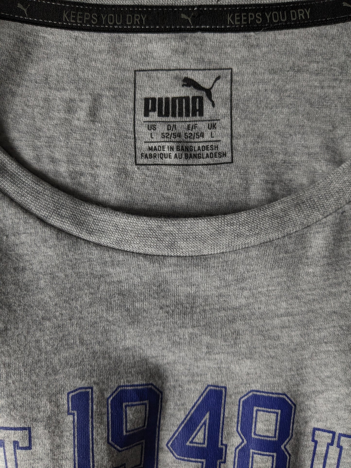 Puma -Hemd. Grau mit Druck gemischt. Größe L.