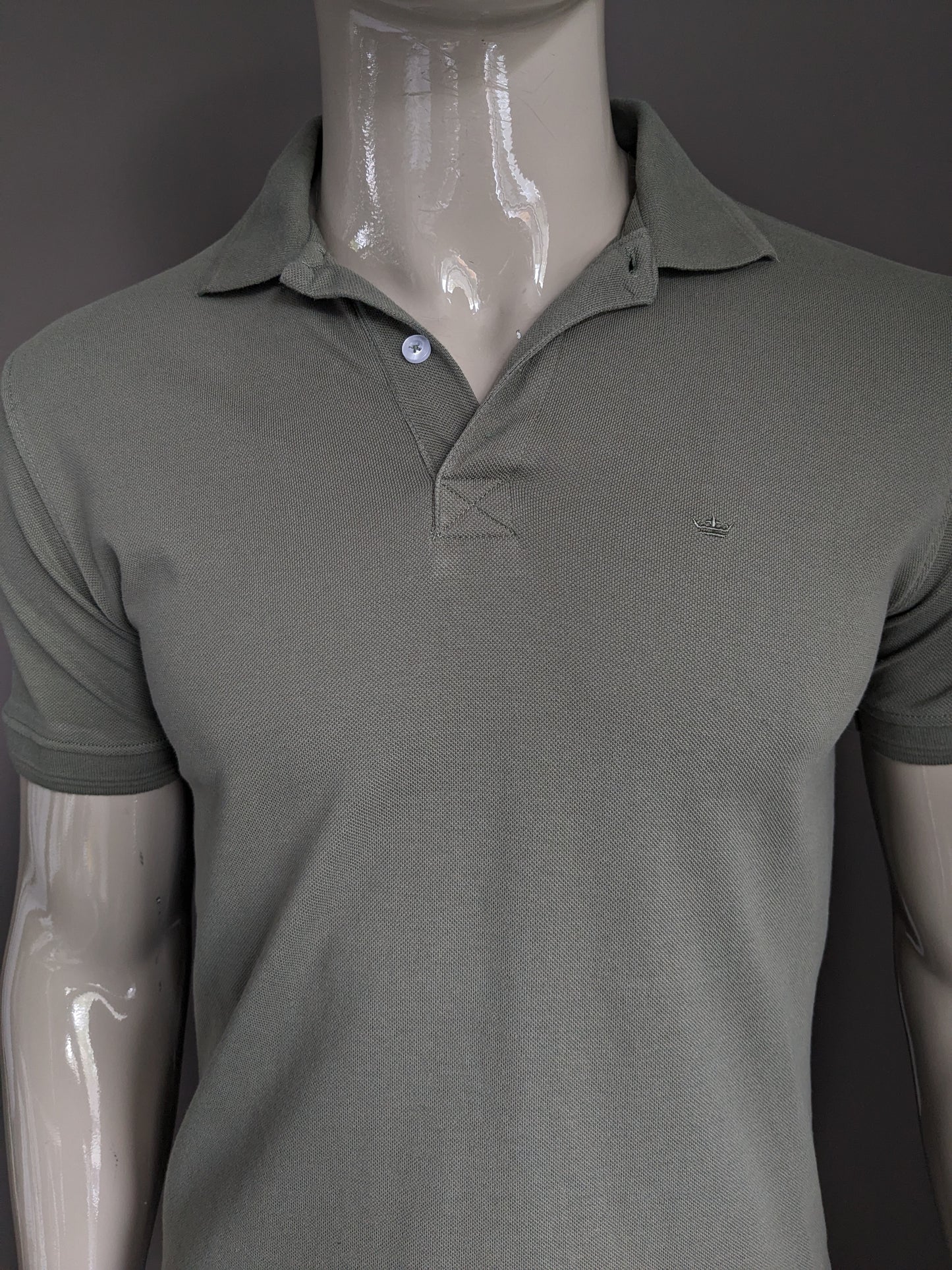 Meyer & Meyer Polo. Colored green. Size M.