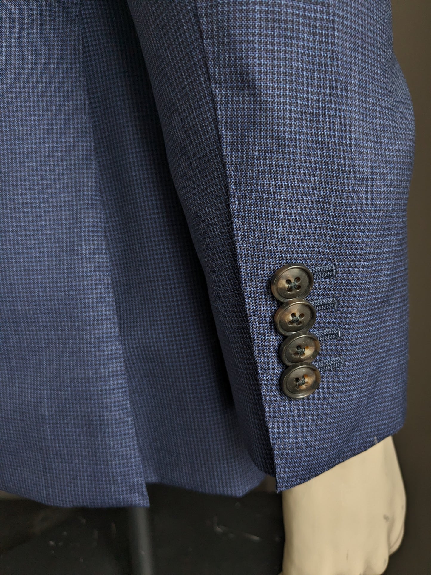 Giacca di lana di tuta. Motivo nero blu. Taglia 48 / M.