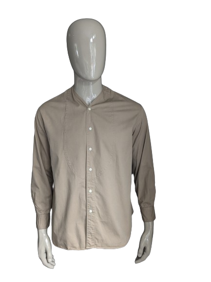 Chemise workware avec col en V De couleur beige. Taille L.