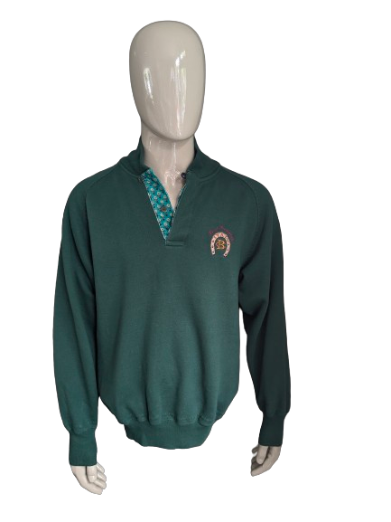 Vintage Olmes Carrelli Pullover mit Knöpfen. Dunkelgrün mit Applikation. Größe L/XL.