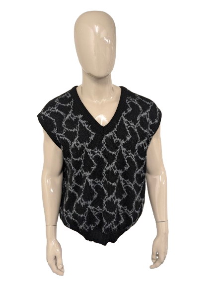 Vintage-Spencer. Schwarz-grün-graues Motiv mit leichten Glitzerfäden. Größe L/XL.