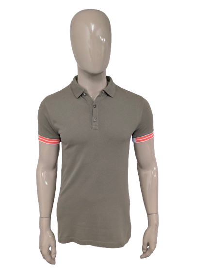 Genti-Polo. Grün gefärbt. Größe L. Hautpassform.
