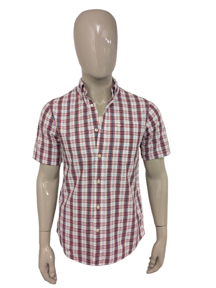 Chemise Dockers manches courtes. Carreaux blanc bleu rouge avec motif côtelé tactile. Taille S.
