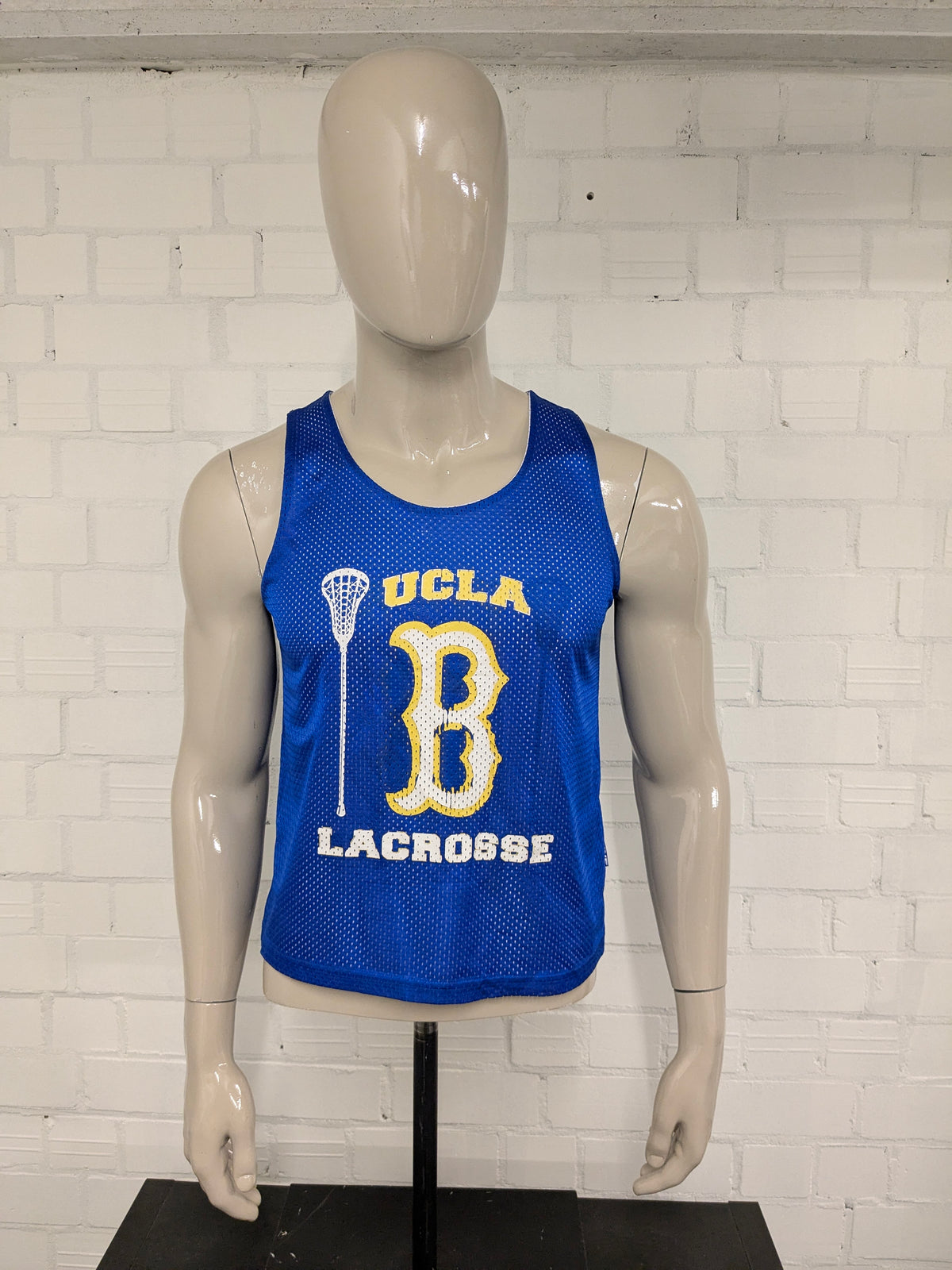 Chemise/singulet de sport UCLA Lacross. Bleu avec imprimé. Taille M.
