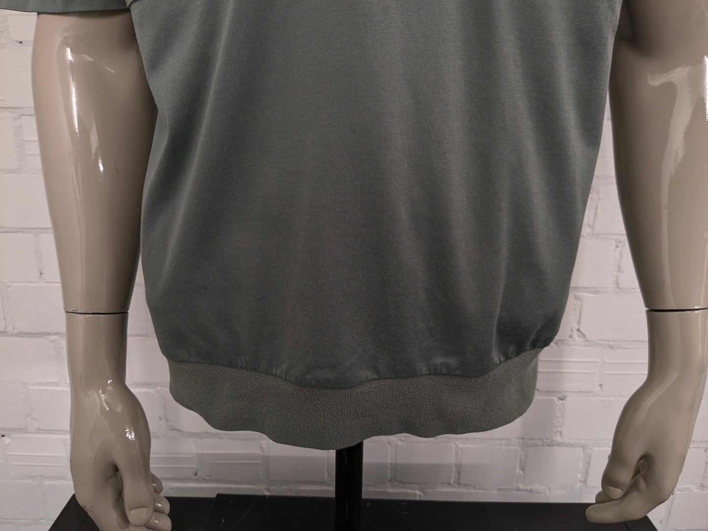 Roger Kent vintage polo met elastische band. Groen gekleurd. Maat L.