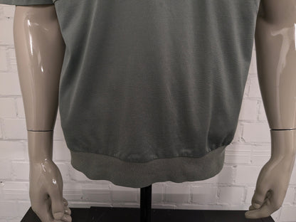Roger Kent vintage polo met elastische band. Groen gekleurd. Maat L.