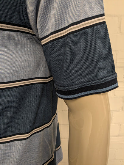 Comandante Polo. Rayas de color gris blanco azul. Tamaño L.