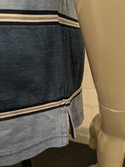 Comandante Polo. Rayas de color gris blanco azul. Tamaño L.