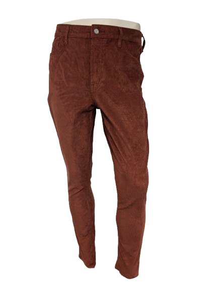 Old Navy Tall Ribbroek. Orange colored. Rockstar Super Skinny. Size W30 - L32. stretch.