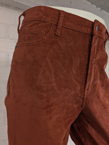 Old Navy Tall Ribbroek. Orange colored. Rockstar Super Skinny. Size W30 - L32. stretch.