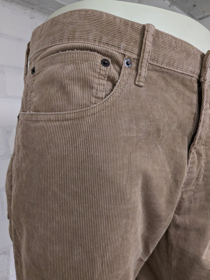 Gap Ribbroek. Light brown colored. Size W36 - L32. Straight fit.